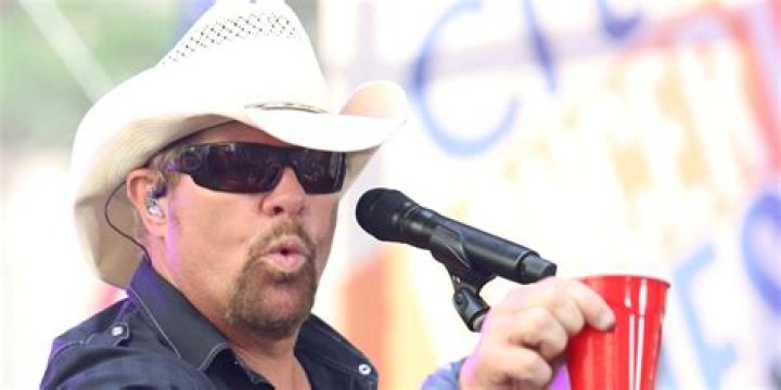 Fans raise a red Solo cup to honor Toby Keith, who immortalized the humble cup in song